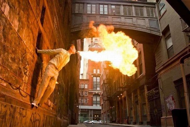 Fire breather performing a flame stunt at a high end outdoor event in Connecticut