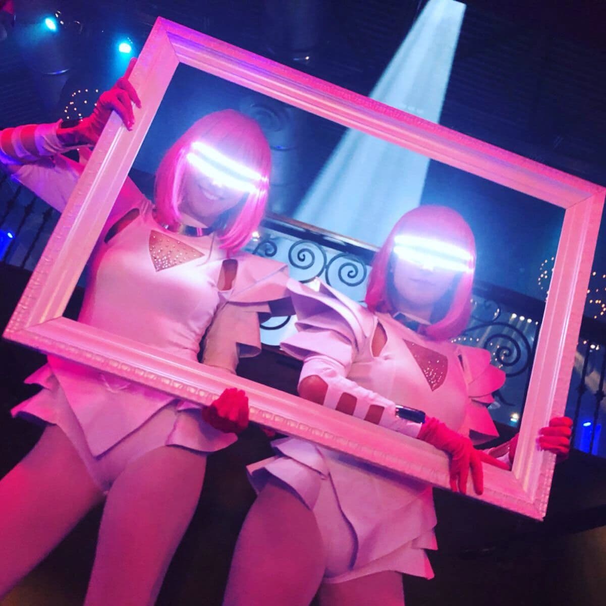 Future Femmes living photo frame performers in metallic costumes at a milestone birthday in New York