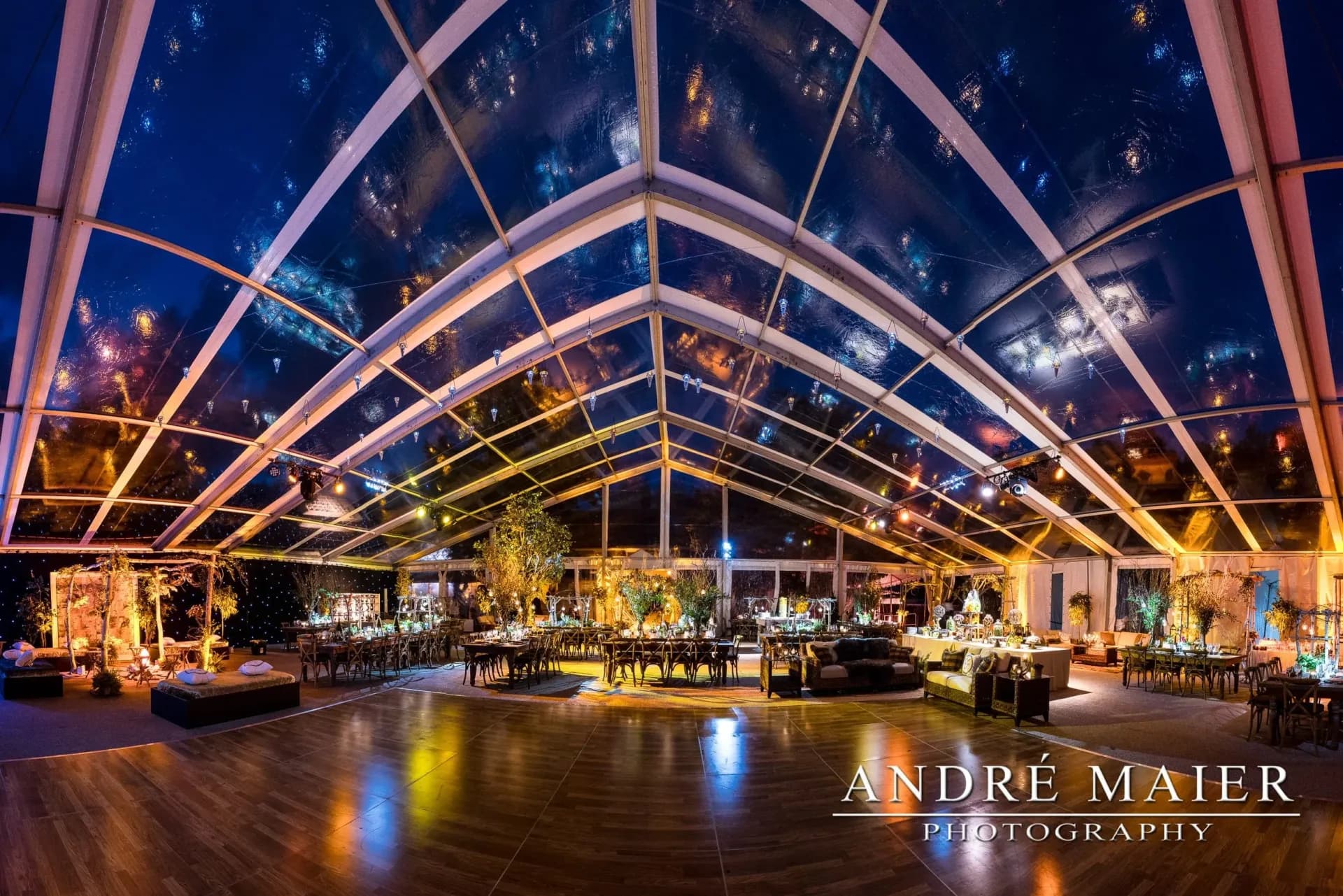 Custom tent event with warm intelligent lighting