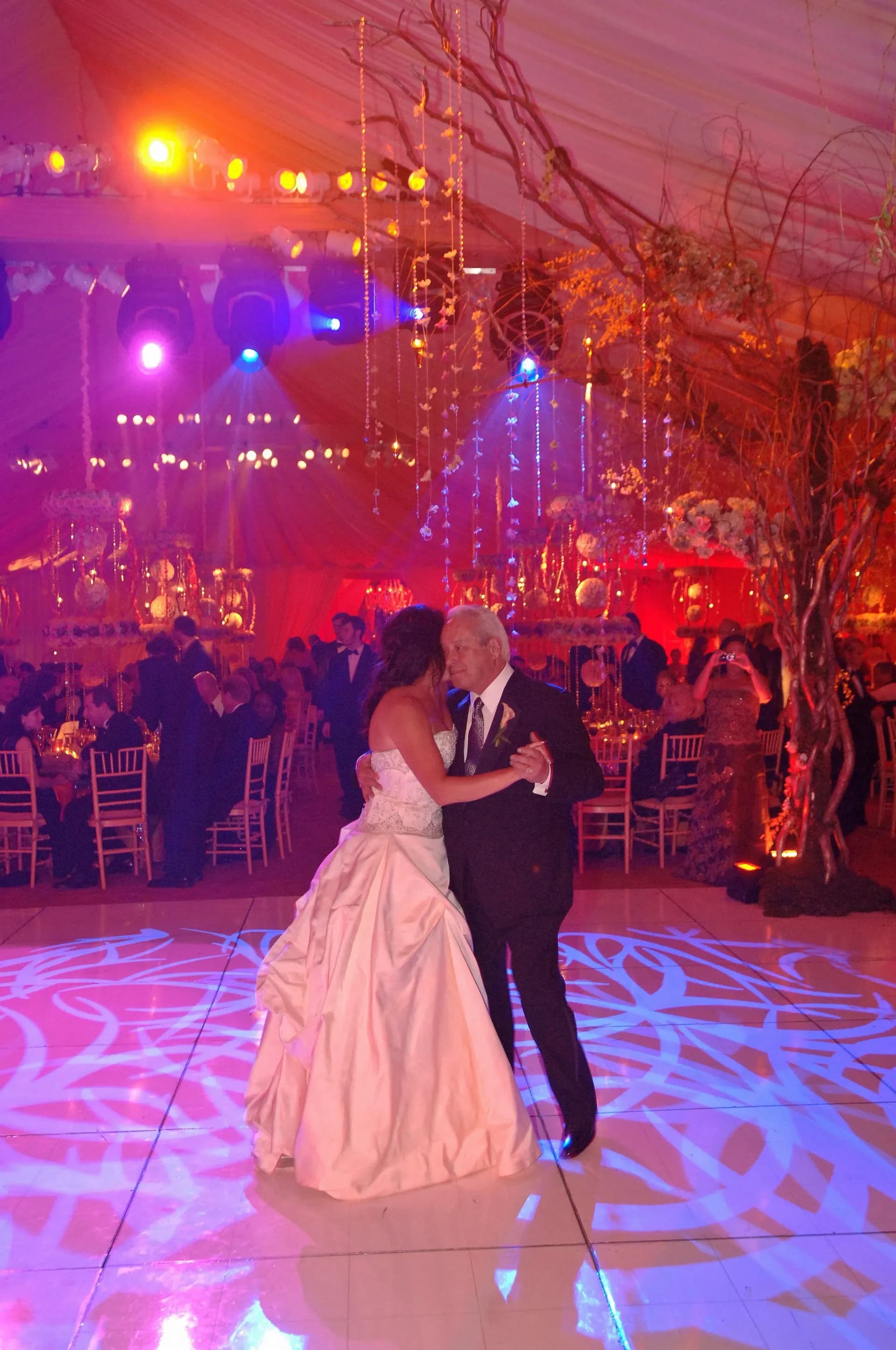 Wedding first dance on a custom monogram dance floor