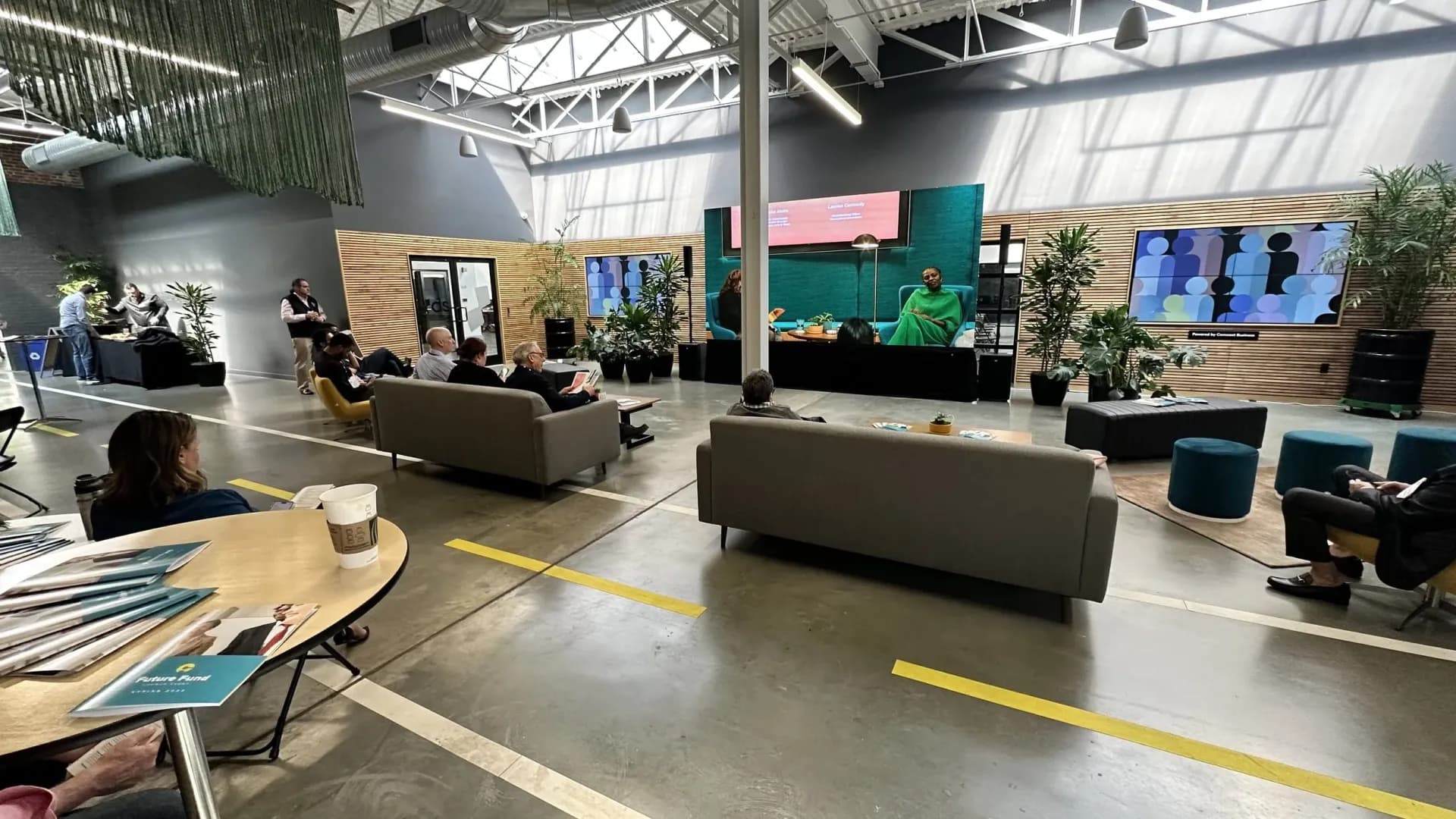 LED video wall feeding a corporate overflow lounge