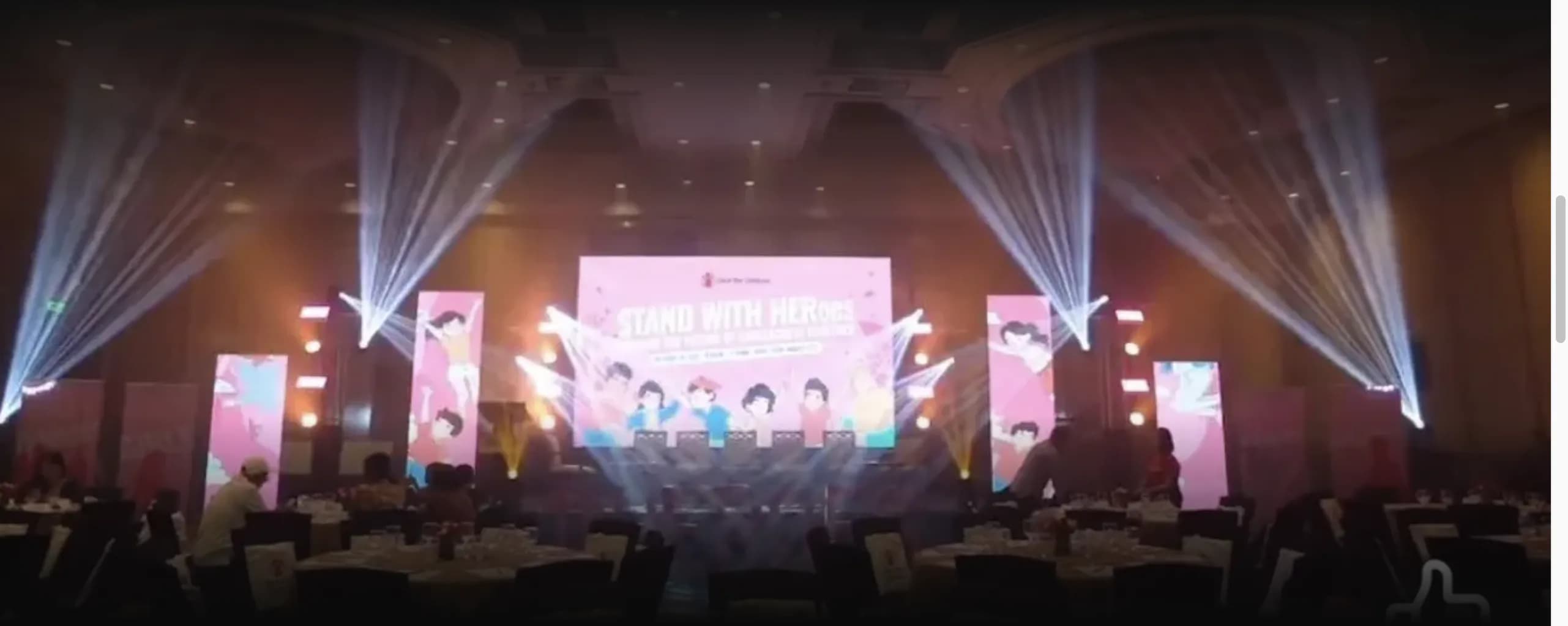 A Nicholson Events gala with LED video walls, light beams, and full stage production over a seated ballroom