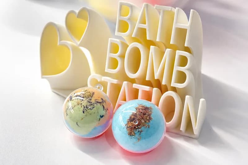 Rows of finished custom bath bombs in assorted colors from an event bath bomb making station