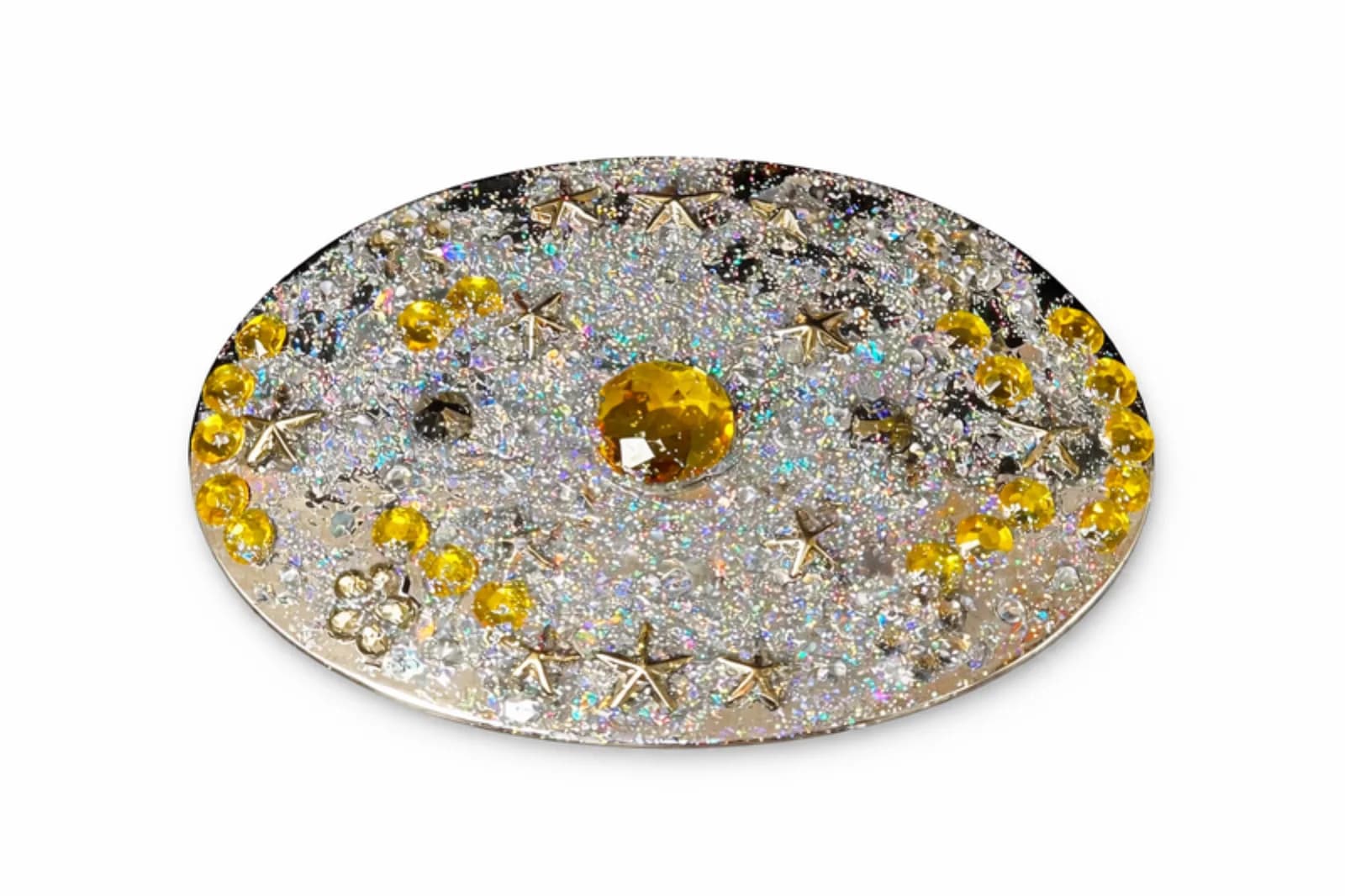 Belt buckle covered in silver glitter and yellow rhinestone gems, a sparkling keepsake from the bling a belt buckle station