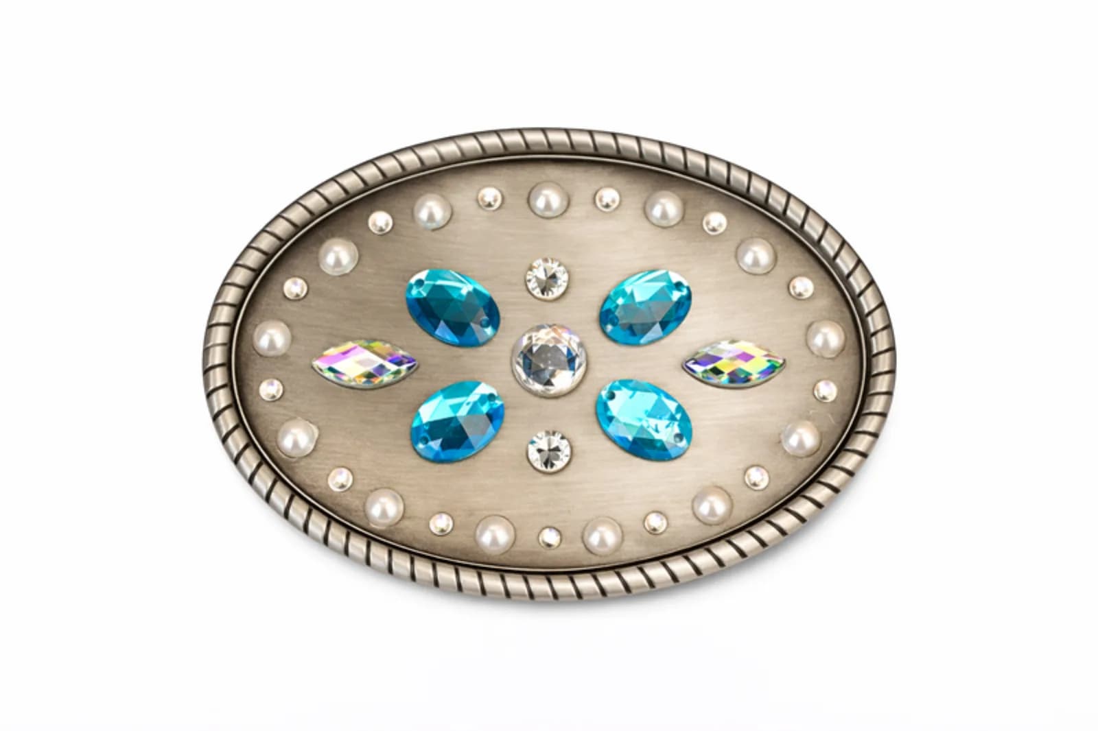 Silver belt buckle bedazzled with blue and clear rhinestone gems and a pearl border at a bling a belt buckle station