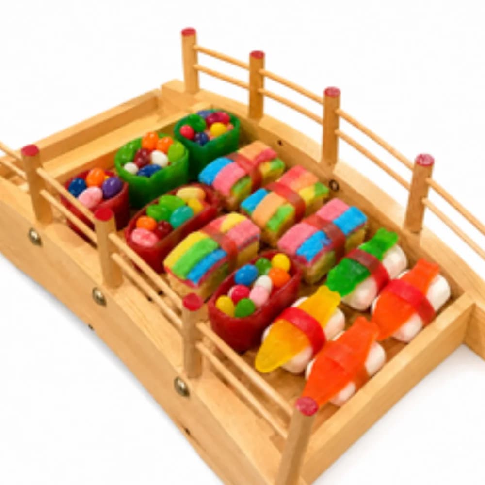 Candy sushi dessert station with colorful sweet sushi rolls made from candy and marshmallow