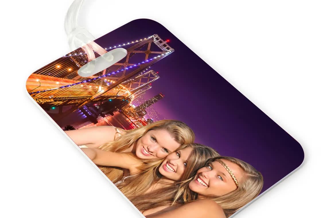 Custom luggage tag favor printed with an illuminated bridge skyline travel background
