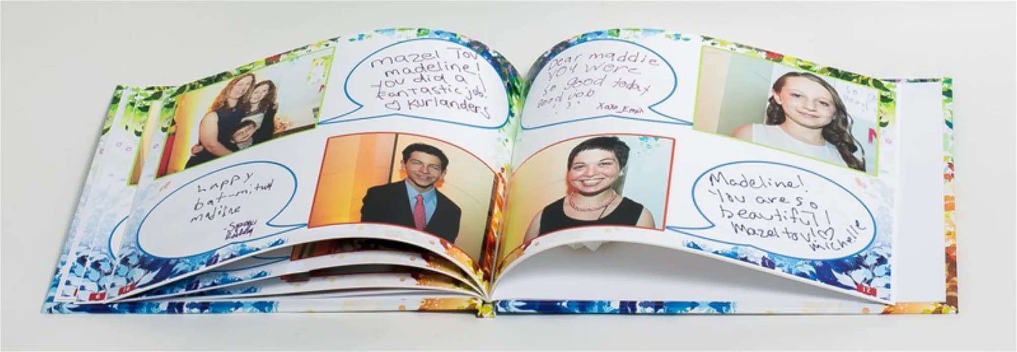 Open photo guestbook spread with guest messages from a bat mitzvah