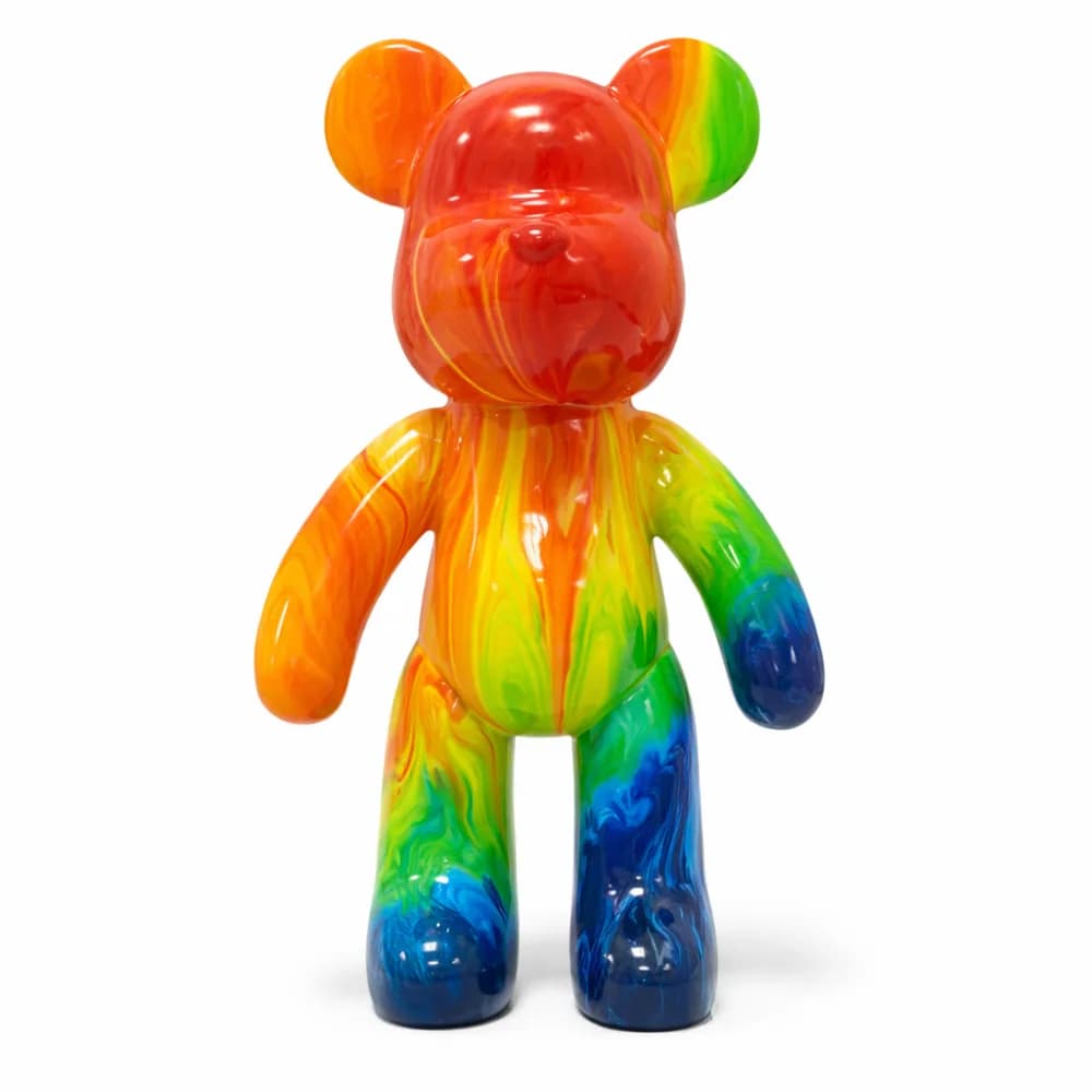 Single rainbow pour-paint bear figure in red, orange, yellow, green, and blue tones on a white background