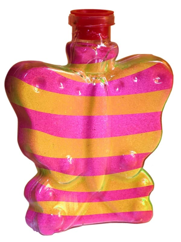 Butterfly shaped bottle filled with layered pink and yellow sand at a sand art station