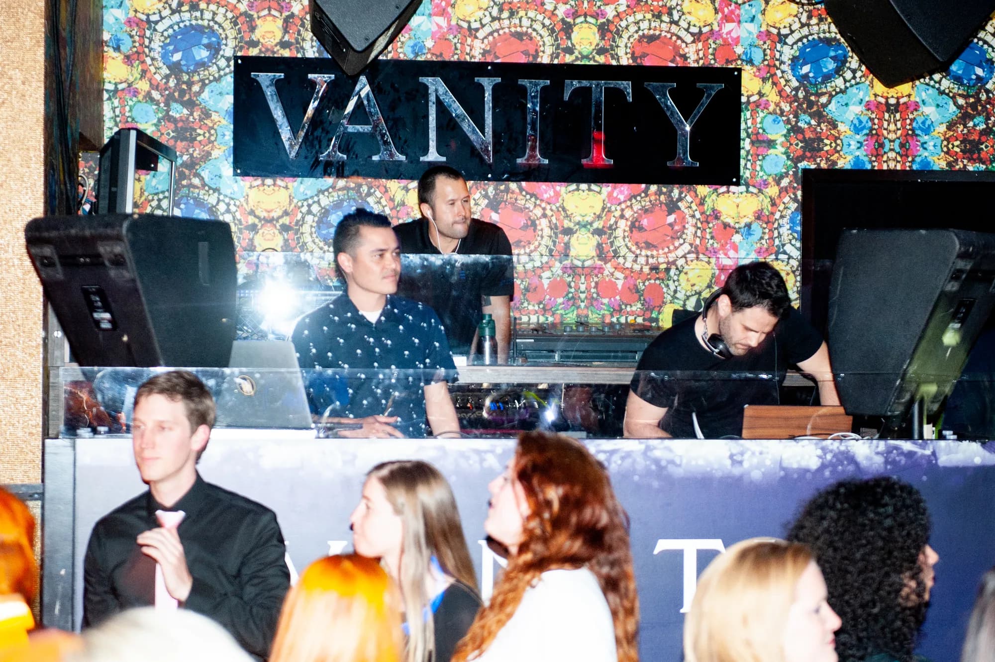 Guests in cocktail attire at an upscale evening event with Gabriel on the decks