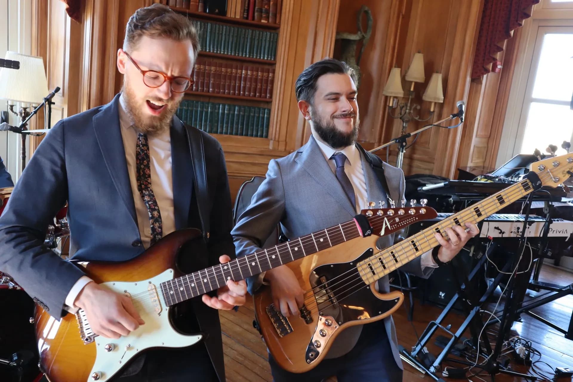 Live guitarist performing at a cocktail hour event