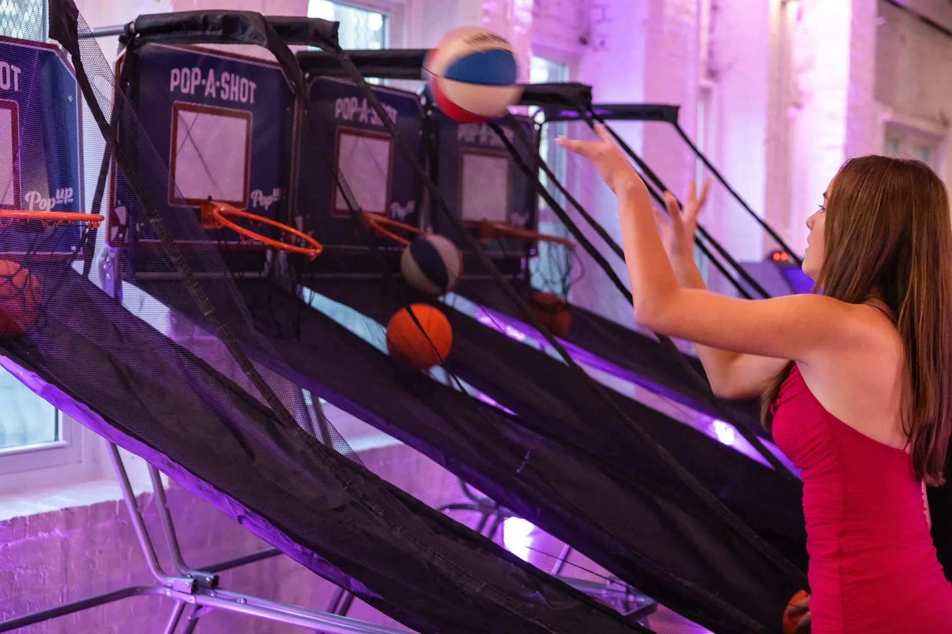 Pop-a-Shot arcade basketball game at a bar mitzvah in NYC, freestanding hoop with electronic scoreboard and automated ball return