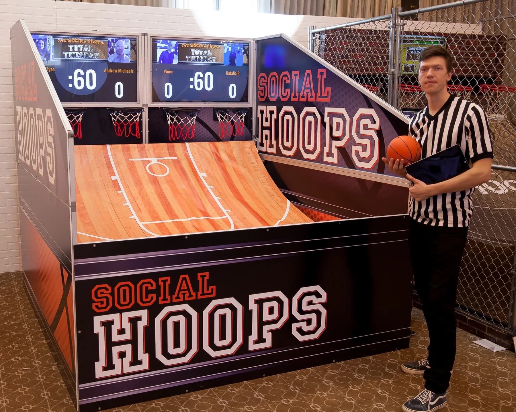Social hoops basketball shooting game at a bar mitzvah celebration, LED-lit electronic basketball hoop with score display
