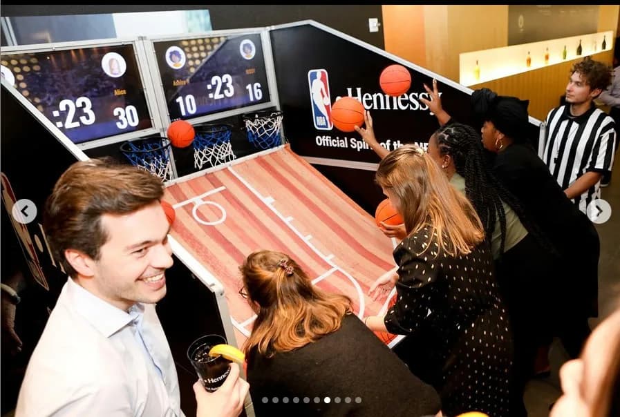 Interactive basketball shooting game with digital scoreboard at a sweet 16 or bar mitzvah event in Connecticut