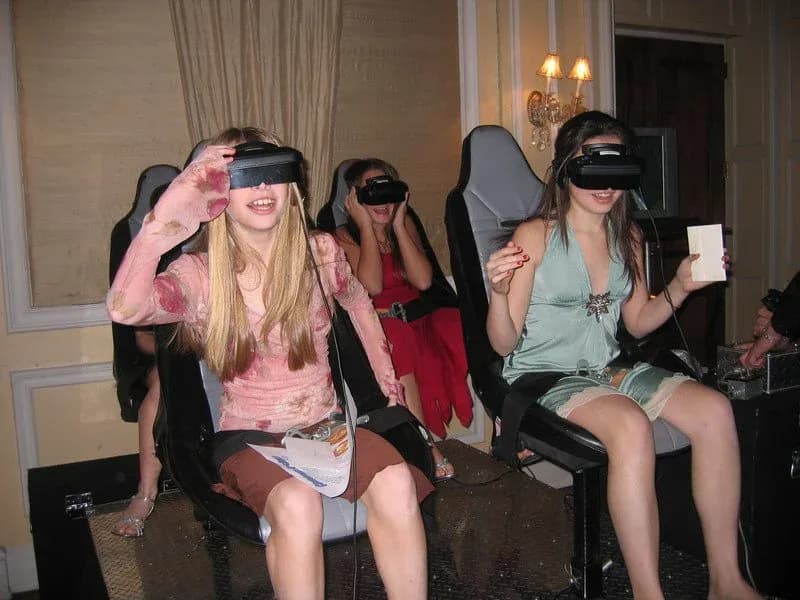 Immersive virtual reality coaster motion ride detail at an event in Connecticut or New York, enclosed simulator with 3D goggles