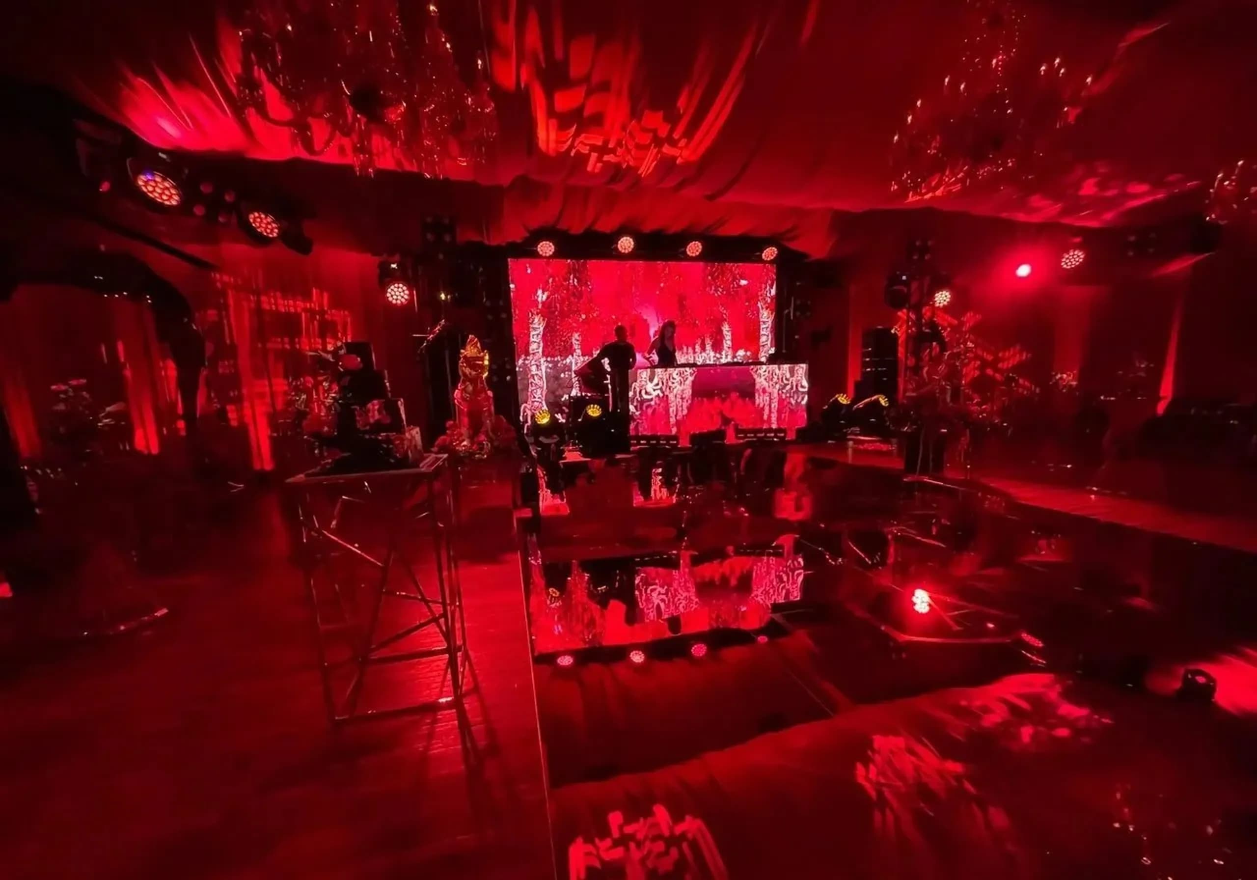 Nicholson Events LED stage production with red lighting at a luxury event in NYC