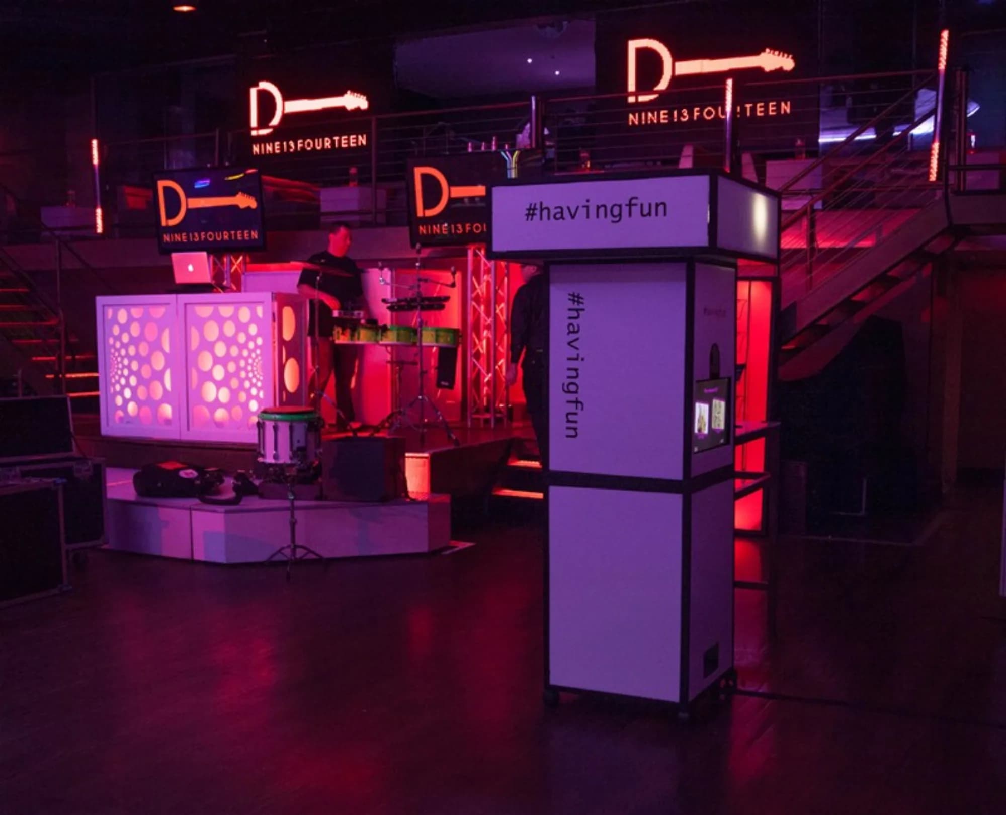 Illuminated hashtag photo booth tower displaying a custom event hashtag at a large bar mitzvah celebration
