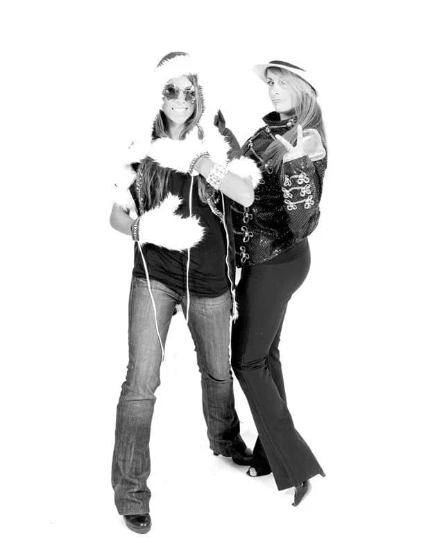 Two guests styled and photographed in black and white for the fashion shoot photo experience