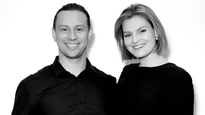 Black-and-white glamour portrait of a couple produced by the glam photo booth at an event