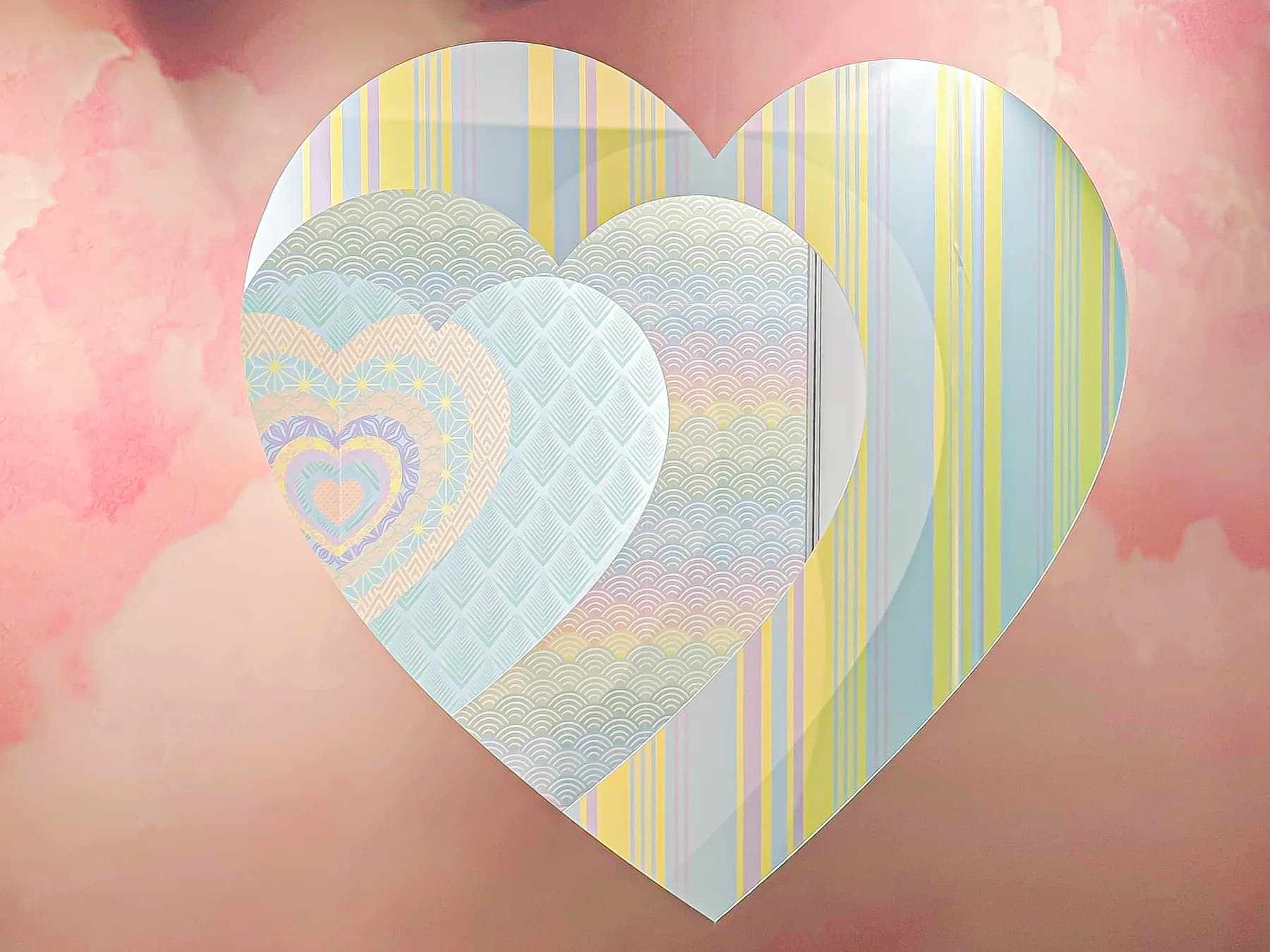 Design render of the nested endless hearts wall structure showing the layered infinite-depth visual effect