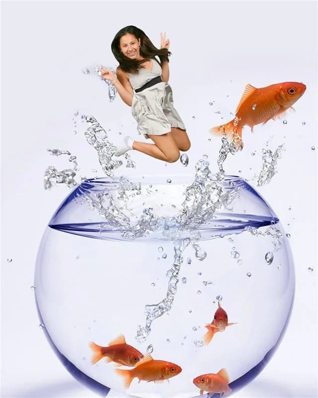 Guest composited mid-air leaping out of a giant fishbowl in a themed jump shot activation