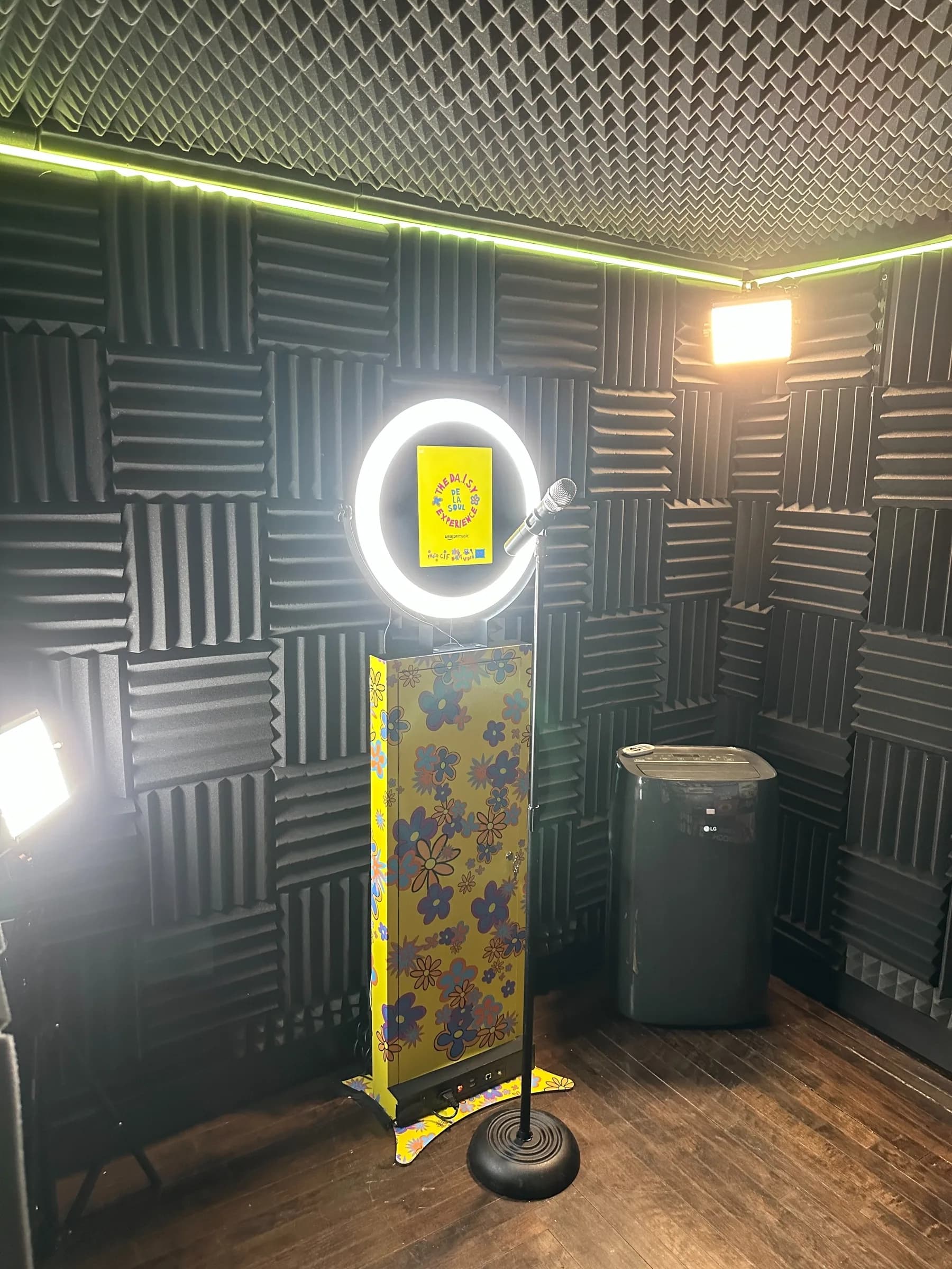 Video guestbook booth with professional ring light and microphone in an acoustic-treated enclosure