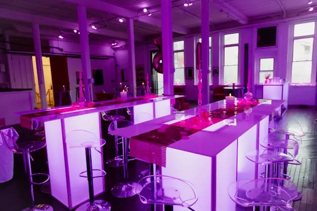 Sweet 16 celebration with purple uplighting in the Armstrong Gallery at The Knowlton, the Nicholson Events venue in Bridgeport, Fairfield County CT
