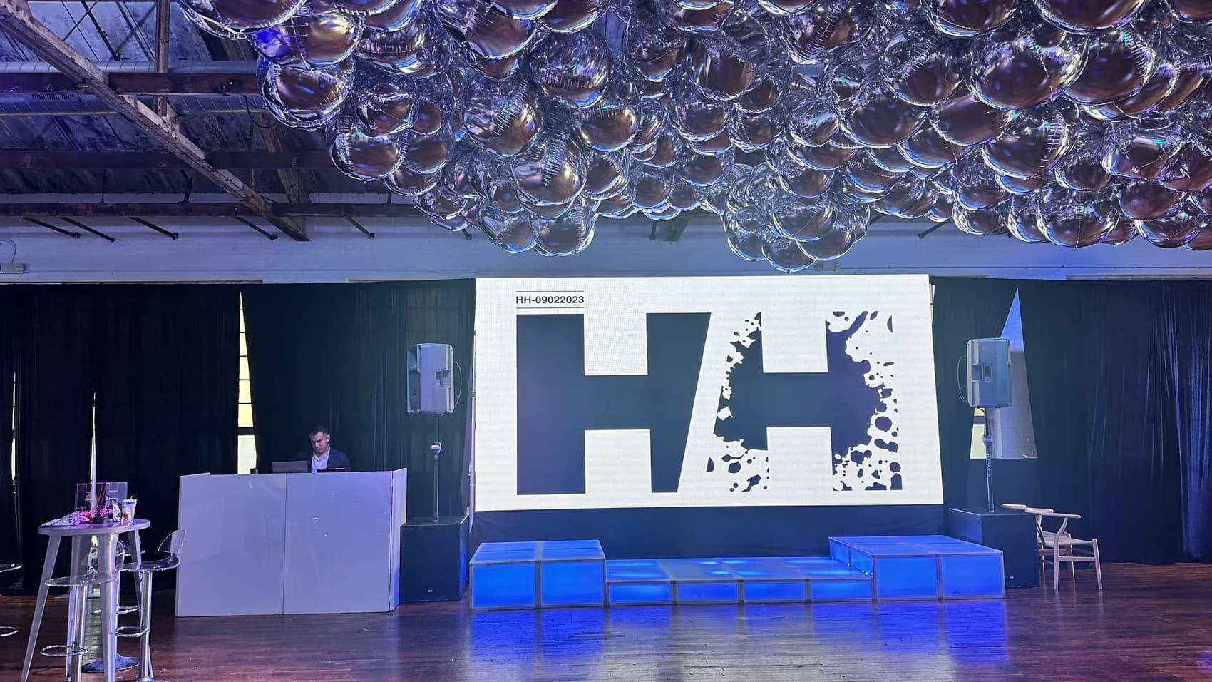 Bar mitzvah stage with a custom monogram and production lighting at The Knowlton venue in Fairfield County, CT