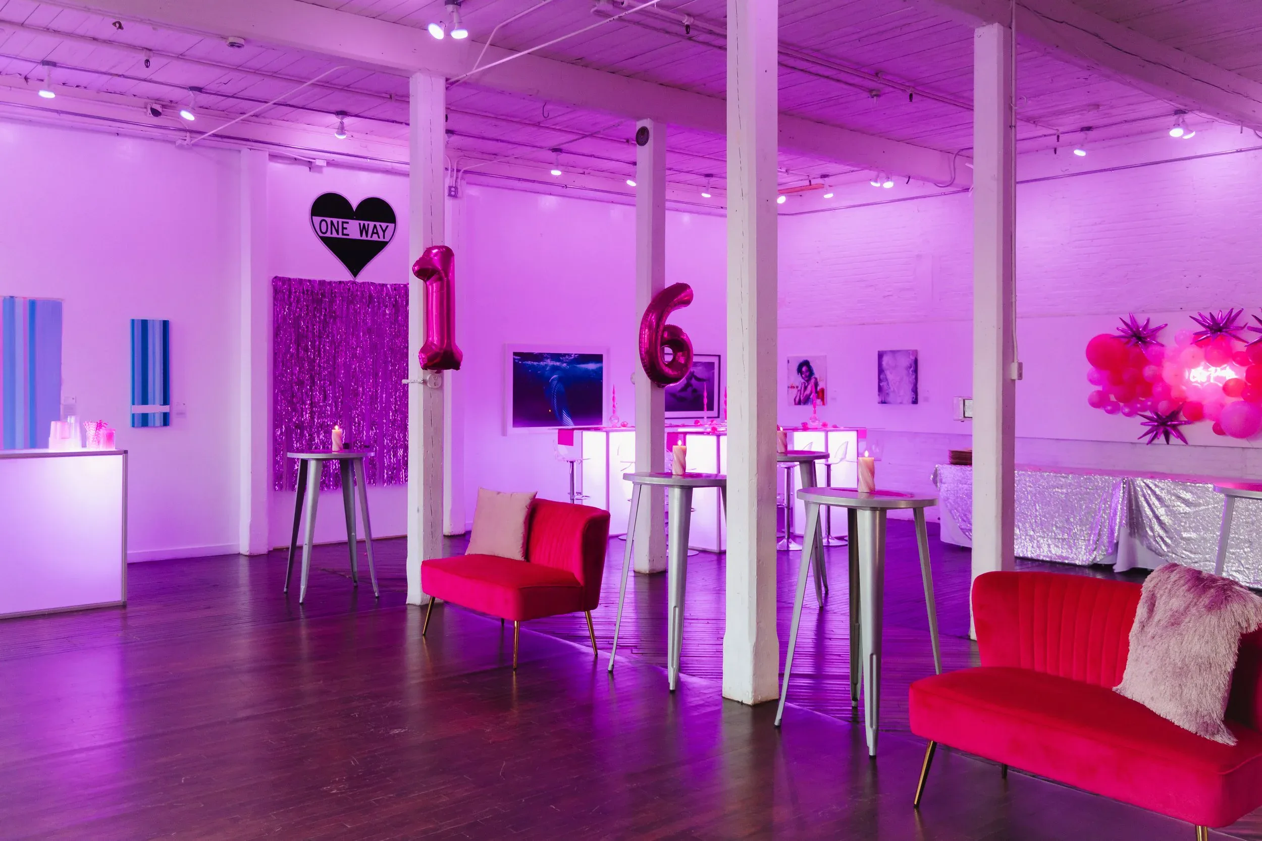 Custom pink lounge seating styled for a wedding in Westport by a Nicholson Events planner